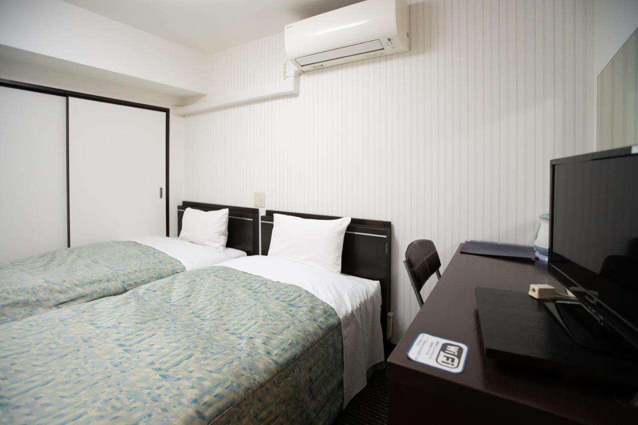 Business Inn Sennichimae Hotel Osaka Bagian luar foto