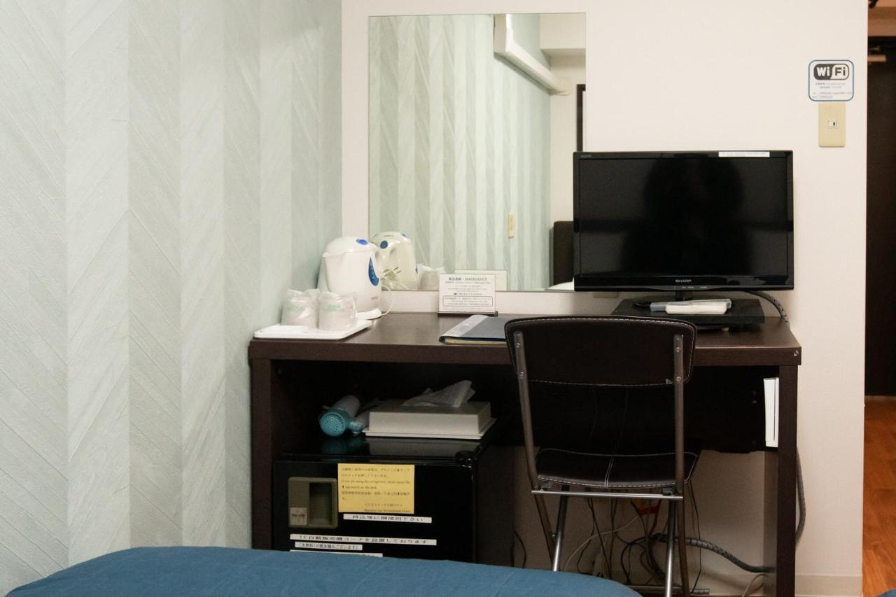 Business Inn Sennichimae Hotel Osaka Bagian luar foto