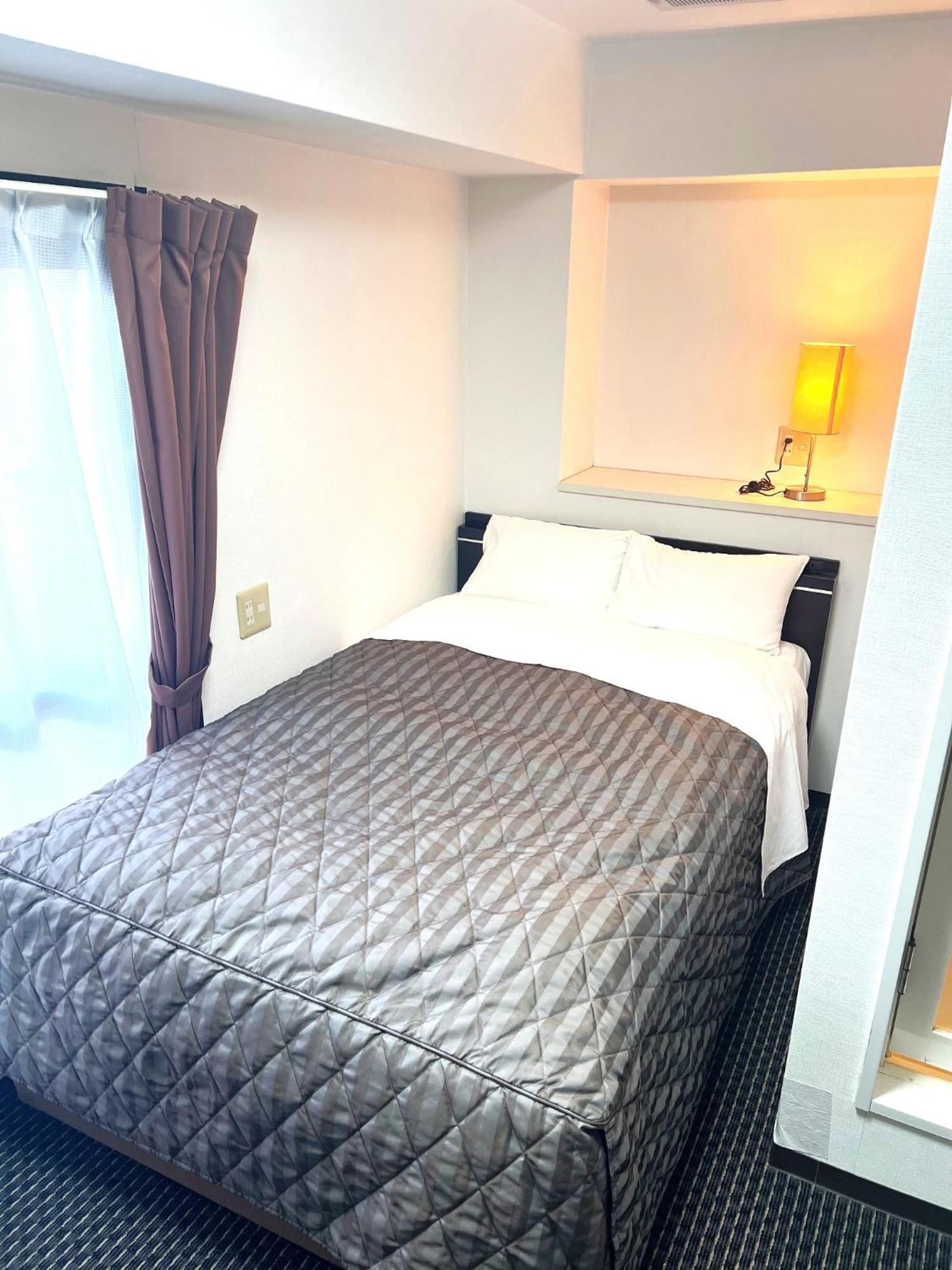 Business Inn Sennichimae Hotel Osaka Bagian luar foto