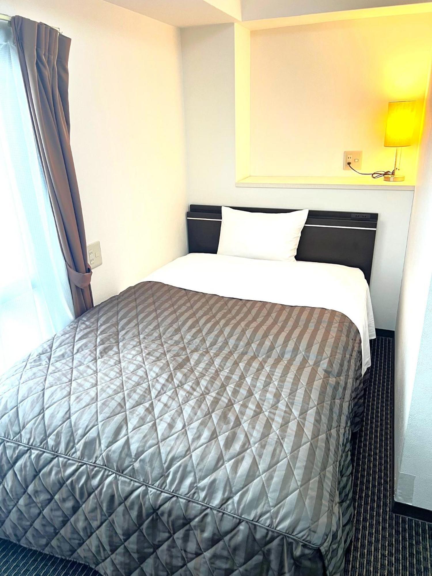 Business Inn Sennichimae Hotel Osaka Bagian luar foto