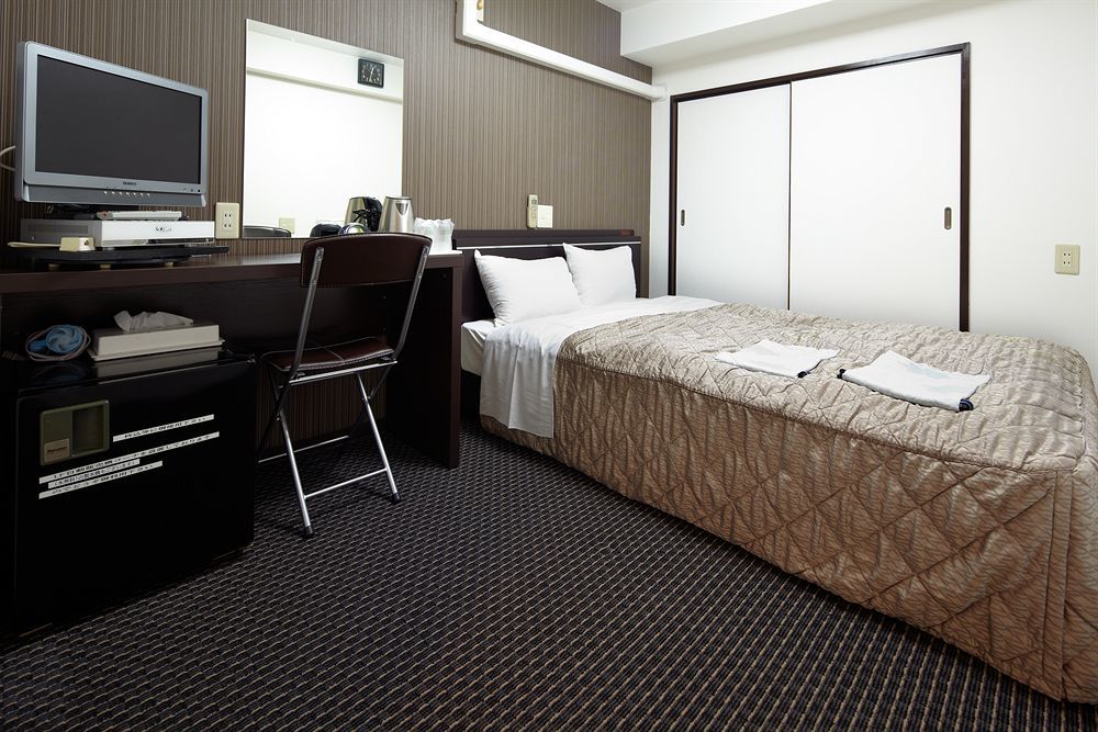 Business Inn Sennichimae Hotel Osaka Bagian luar foto