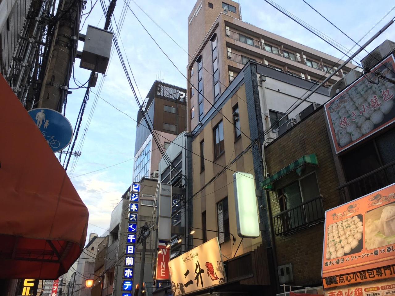 Business Inn Sennichimae Hotel Osaka Bagian luar foto